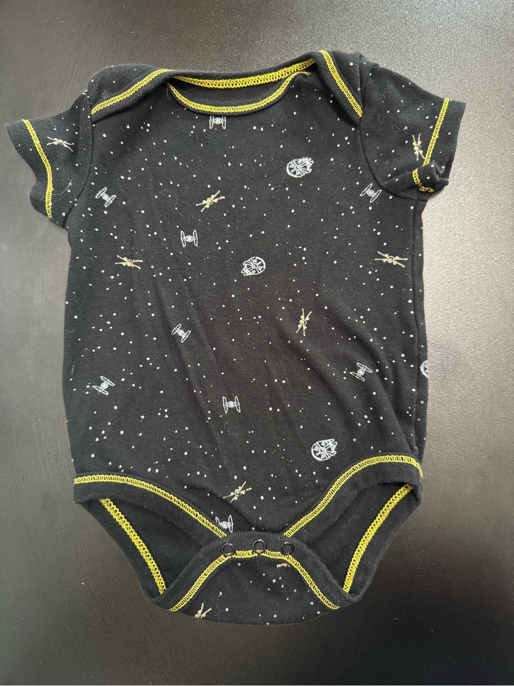 Star Wars Black Baby One-Piece Bodysuit with Yellow Trim